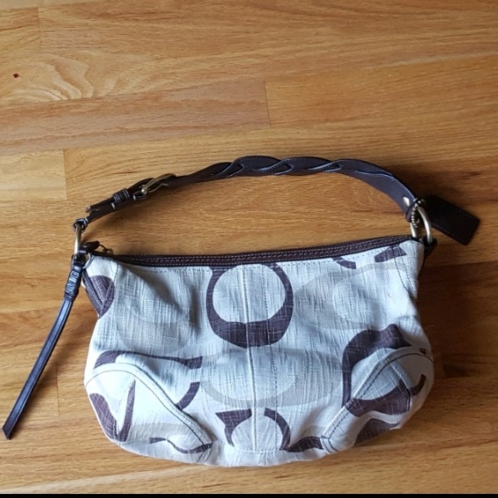 Authentic COACH over the shoulder purse. Has official coach leather tag inside.